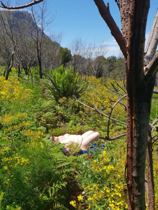 I love walking nude in the country side, This particular day the flowers were out and made a lovely setting.