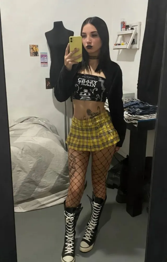 in love with my new skirt, it's giving off Clueless vibes