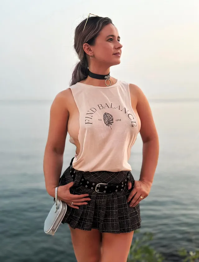 Wearing a tiny sideboob top braless, so you can see every bounce when I walk.  Just waiting for a slip.