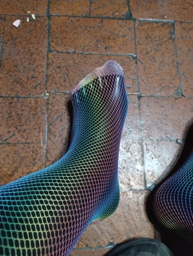 Rainbow fishnets and latex toes perfect combo.