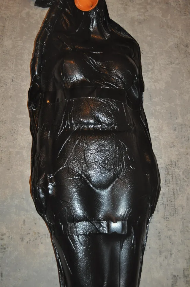 Tightly mummified with vacuum sealing