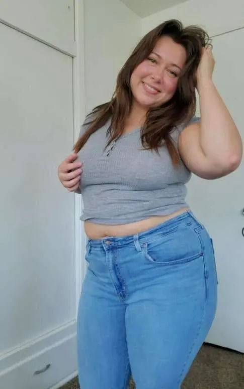 Messy hair and tight jeans