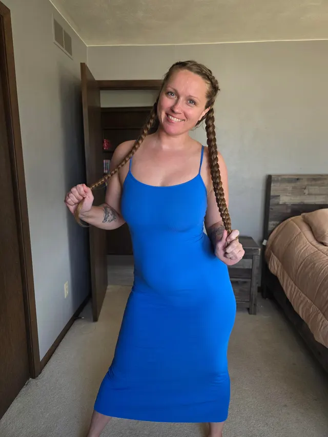 Take a peek at the mom bod hiding under this dress