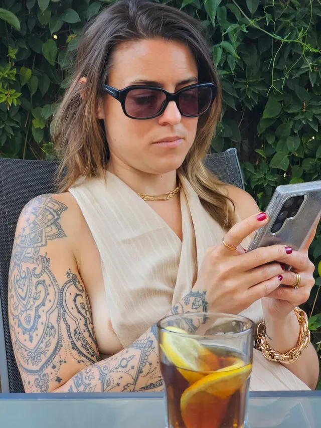 My tit was about to pop out of my dress. Rather than make me aware, my husband decided to take a photo