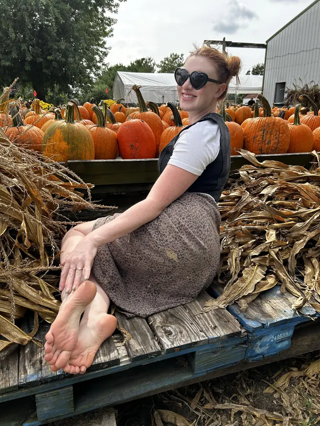 All smiles (and soles) at the pumpkin patch!