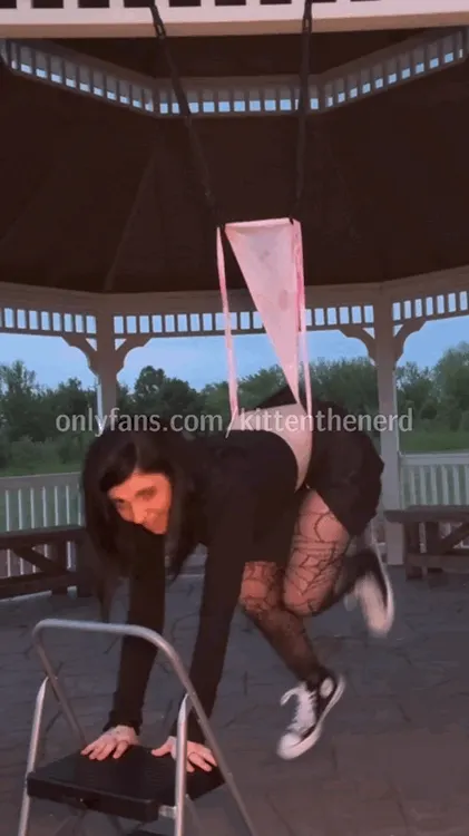 goth girl bungee hanging wedgie in PUBLIC