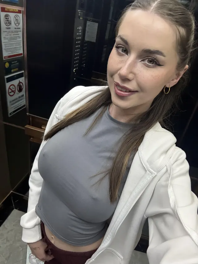 Braless in the elevator
