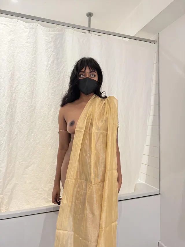 Wearing nothing else (f)