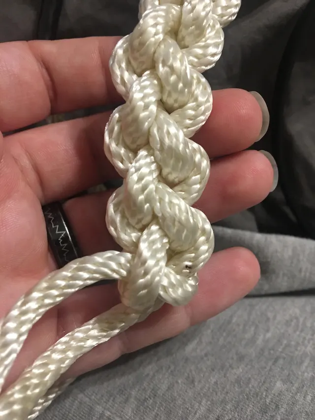 Found this packed away today, can anyone tell me what kind of knot this is? I was shown how to tie it but it was like 4 years ago.
