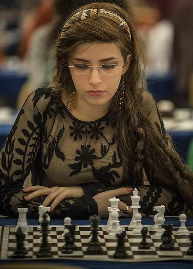 Iranian chess player Dorsa Derakhshani plays for the US team after being banned from playing without her hijab in her own team