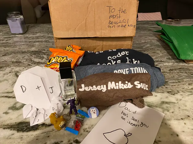 Daddy sent me a care package! It has his cologne and some of his shirts :)