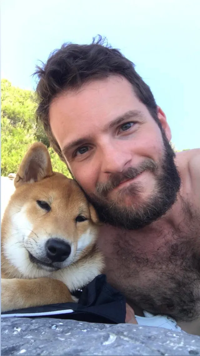 Two puppies at the beach. 🌊