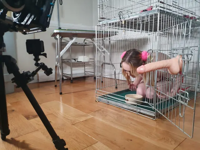 Just a Girl in her cage licking up some water !