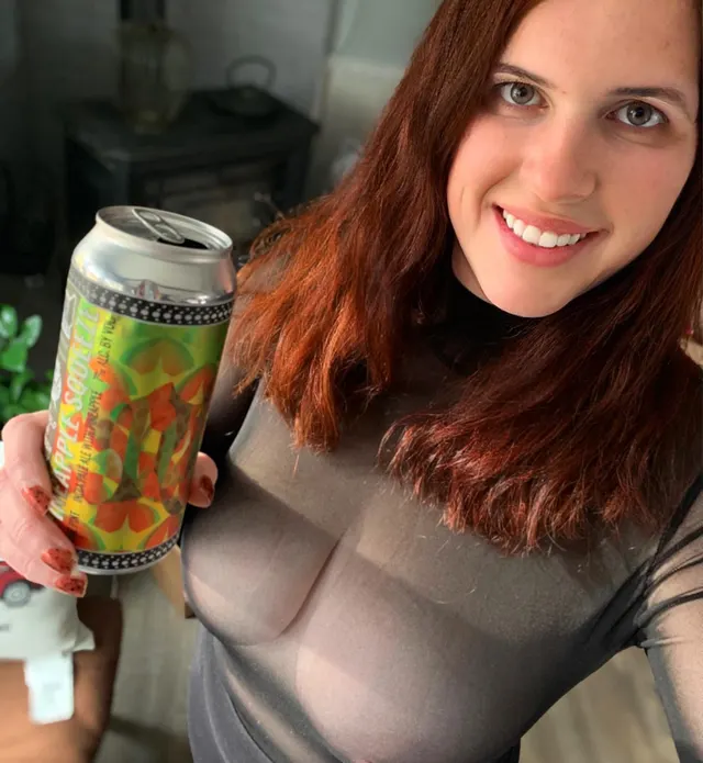 Enjoying a beer Pineapple Squeeze IPA from Short Throw Brewing.