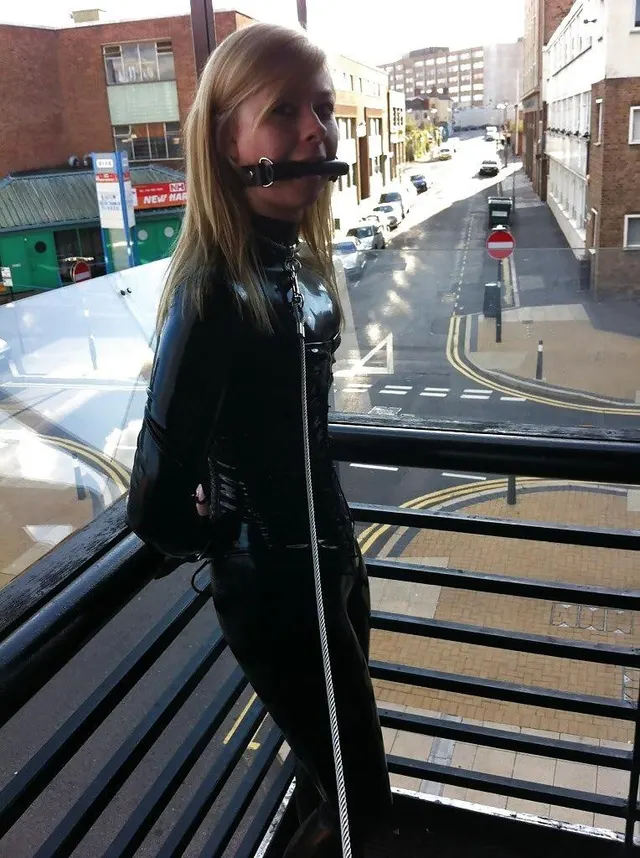 Gagged, on a leash and left to contemplate on the balcony