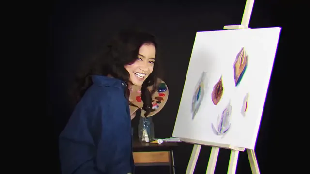 Experience Bianca mastering the art of painting while riding a Motorbunny