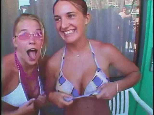 Showing Her Huge Tits to the Crowd