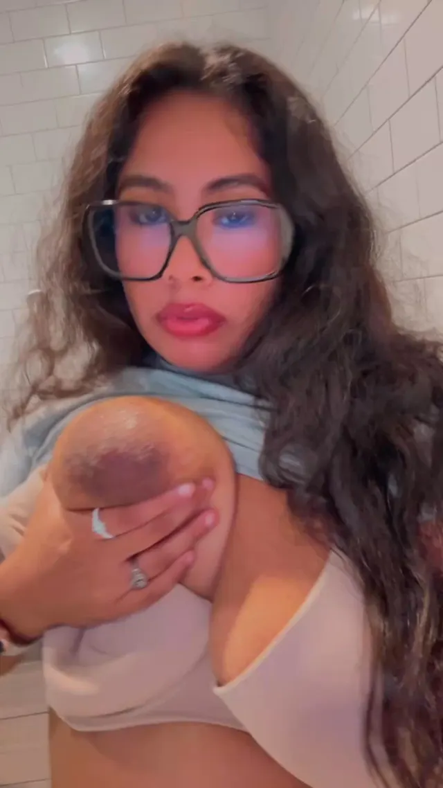 Sucking in my own natural titties