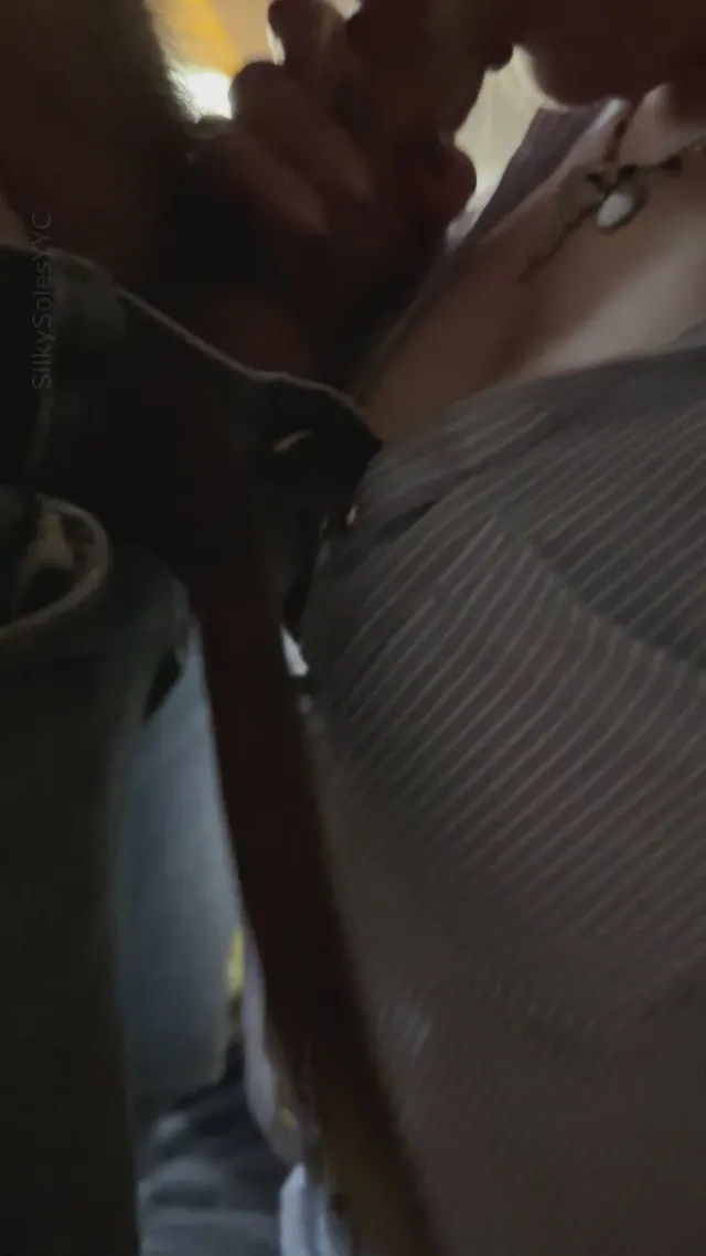 Giving her bull a double blowjob