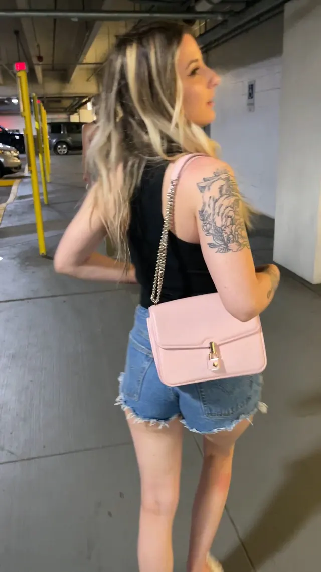 Titties out in the parking garage