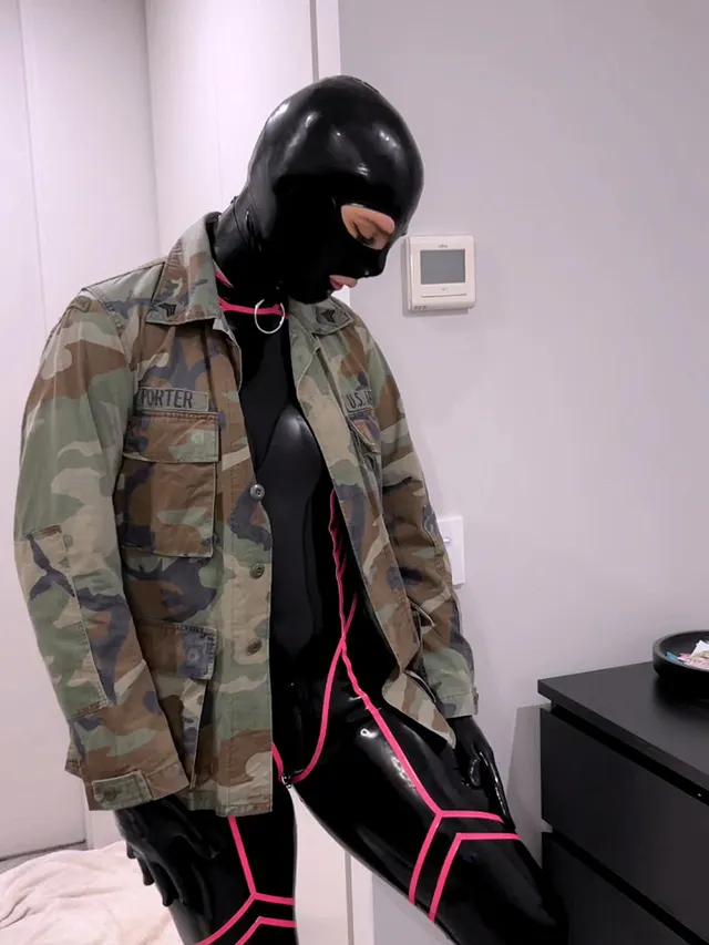 July 4th Weekend Special. What do we think of latex under army jackets? 🤔
