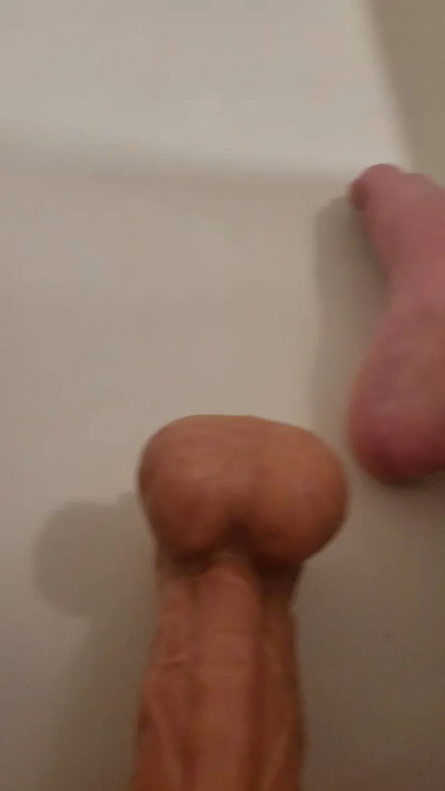 Pissing on my dildo and fucking myself with it