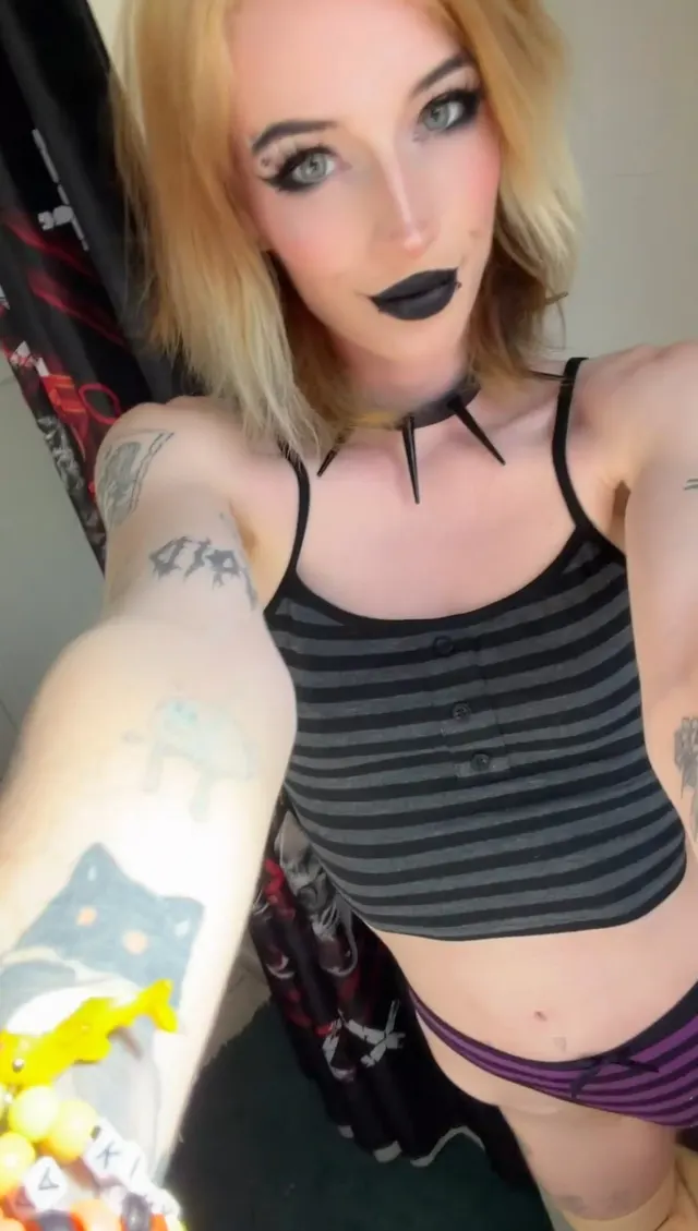 My clothes may be black, but my plug is bright blue!