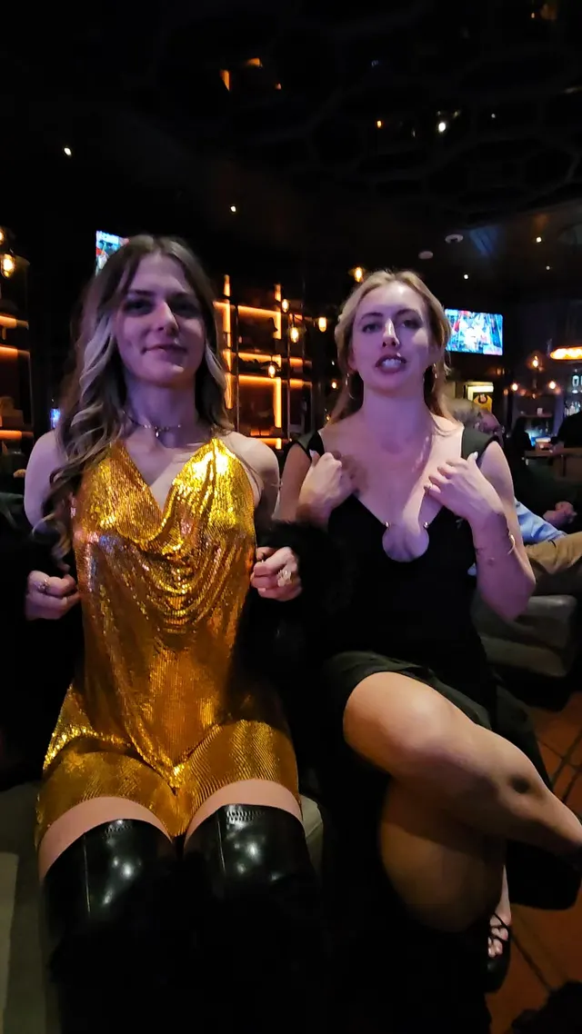 Two girls flashing in a full bar ;)